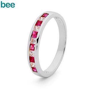 White gold ring with zirconia and synthetic ruby